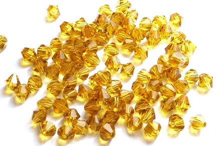 31 Perles en cristal toupies ambre foncées de 4 mm paquet de 100pcs à 8.95€