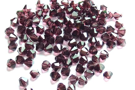 32 Perles en cristal toupies prunes de 4 mm paquet de 100pcs à 8.95€