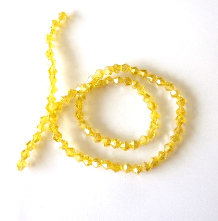  Perles en cristal toupies de 4 mm jaune reflet sur fil de 30cm